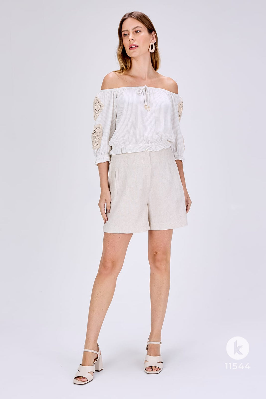 Conjunto de bermuda e blusa bege manga 3/4 - G