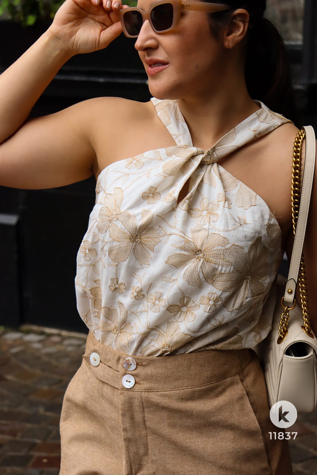 Conjunto de bermuda marrom e blusa - G