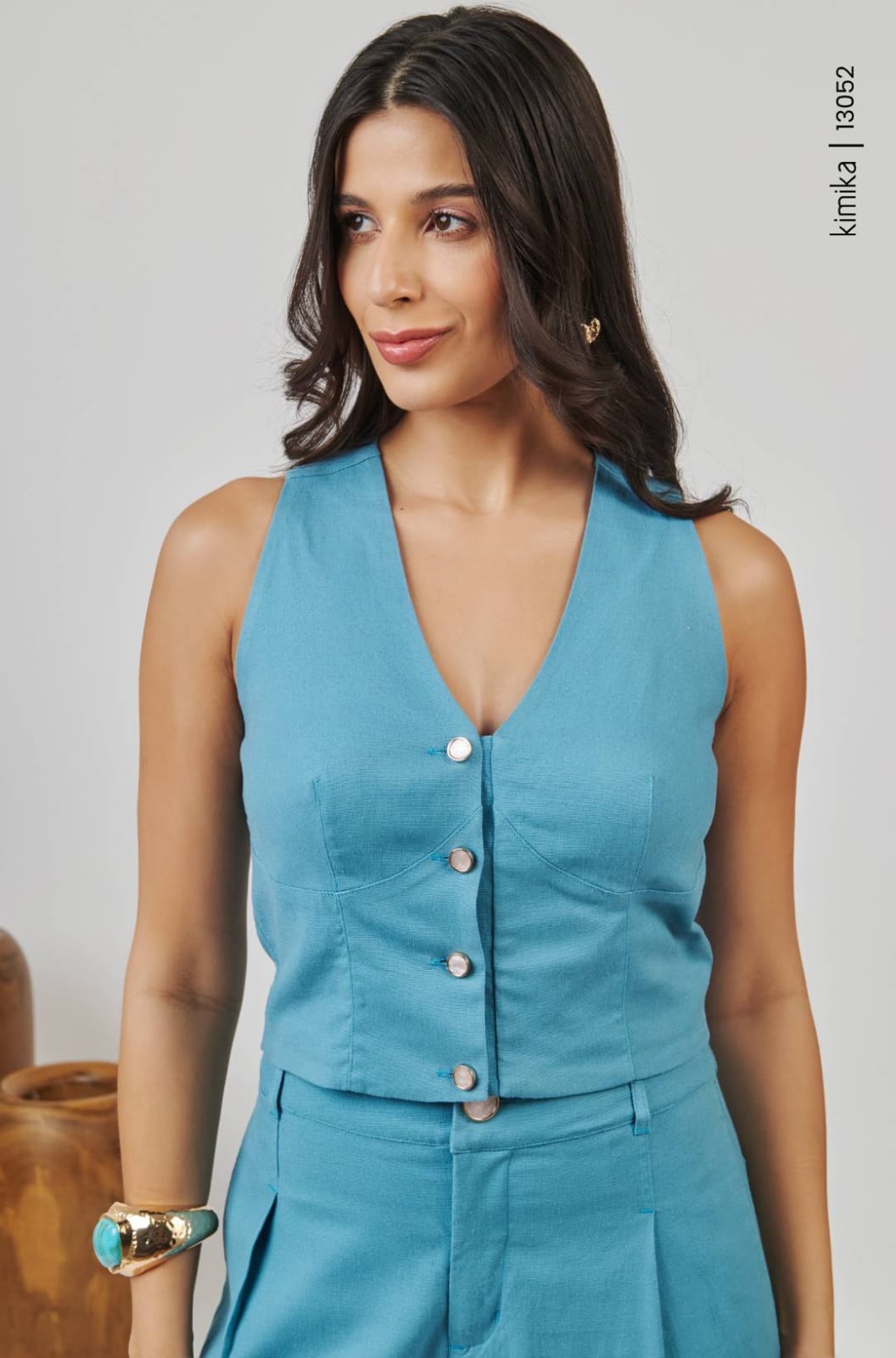 Conjunto de calça e colete azul