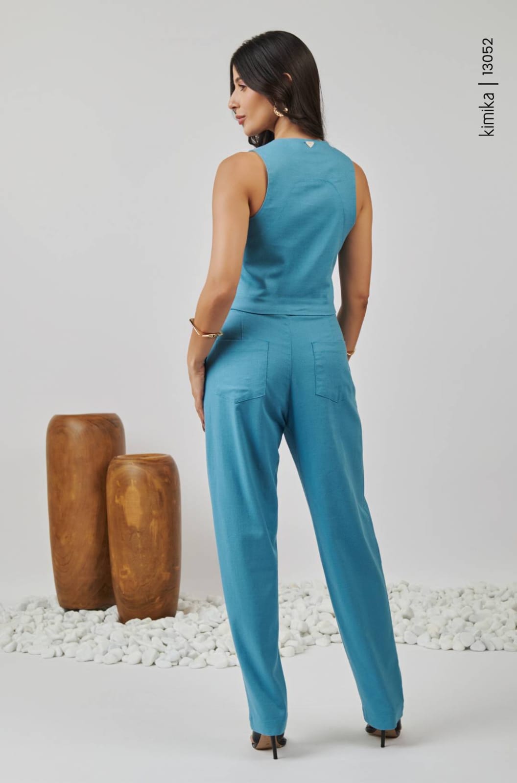 Conjunto de calça e colete azul